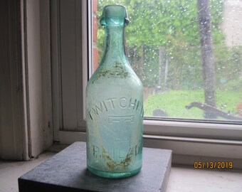 Twitchell light teal glass bottle - Blob top bottle