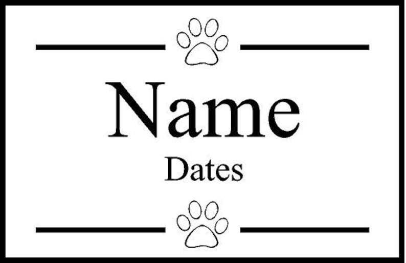 May include: Black and white pet memorial plaque with a paw print design and the text "Name Dates".