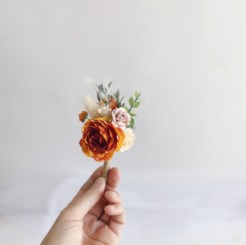 Bridesmaids rust corsages Wedding bracelets orange wrist corsages Floral wrist corsages Bridal bracelet Rust orange flower corsage