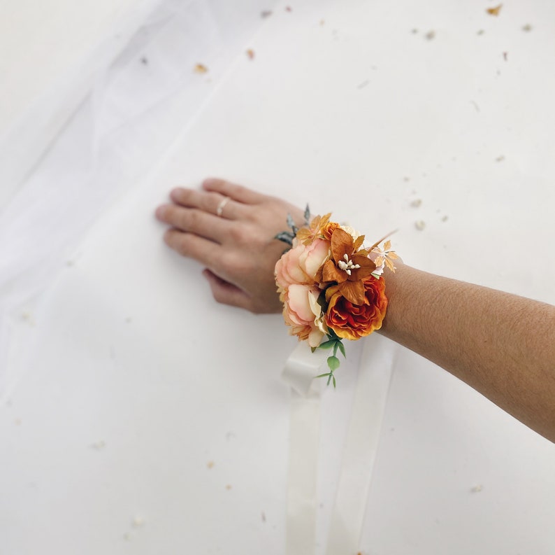 Bridesmaids rust corsages Wedding bracelets orange wrist corsages Floral wrist corsages Bridal bracelet Rust orange flower corsage