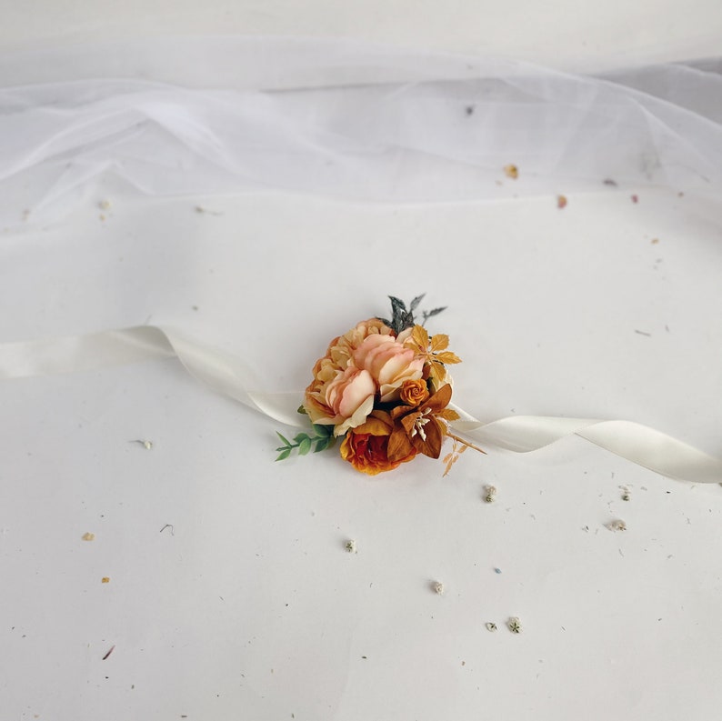 Bridesmaids rust corsages Wedding bracelets orange wrist corsages Floral wrist corsages Bridal bracelet Rust orange flower corsage