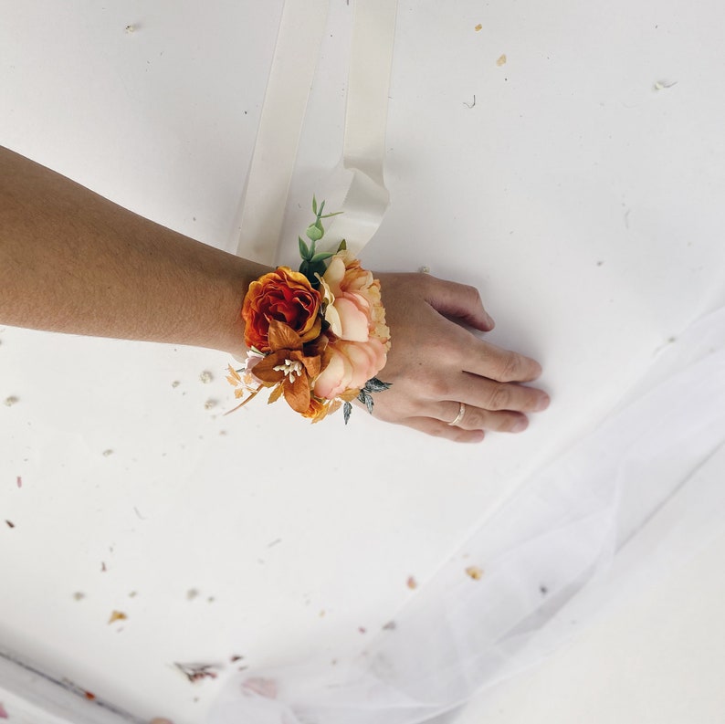 Bridesmaids rust corsages Wedding bracelets orange wrist corsages Floral wrist corsages Bridal bracelet Rust orange flower corsage