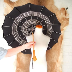Vintage Caramel Bakelite Twist Handle Black Patterned Parasol Umbrella, c. 1940