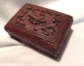 Antique Carved Cinnabar Box with Cloud and Dragon Motif, China, c. 1700