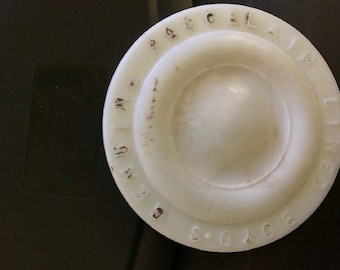 Boyd’s Genuine Porcelain Lined Cap  embossed on circular milk glass lid used with the “Mason” style canning