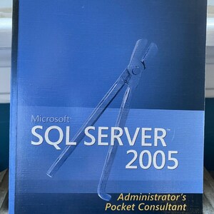 May include: A blue book with the title "Microsoft SQL Server 2005" and the subtitle "Administrator's Pocket Consultant". The author is William R. Stanek.