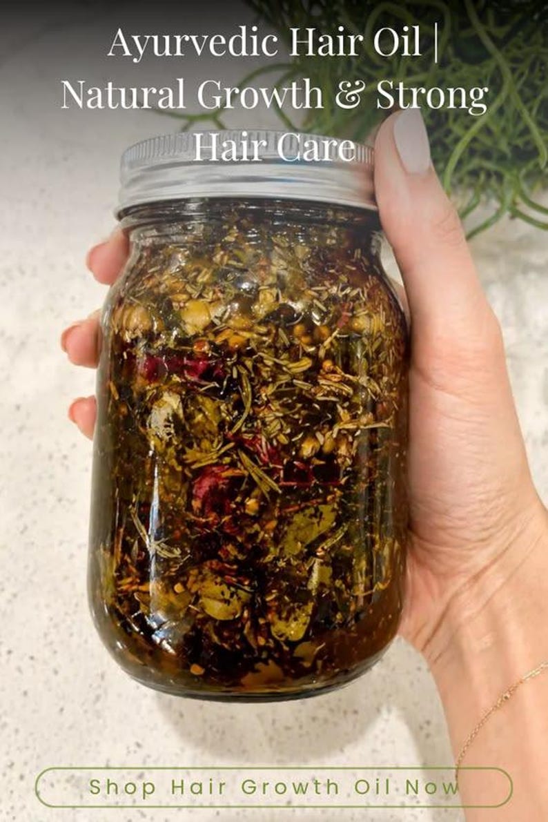 May include: A clear glass jar filled with Ayurvedic hair oil, containing various herbs and botanicals. The jar has a silver lid and is held by a hand. Text on the image reads "Ayurvedic Hair Oil | Natural Growth & Strong Hair Care".