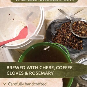 May include: Image of herbal hair oil ingredients and preparation. The text reads "HERBAL HAIR OIL" and "Small Batch Botanical Infusion". Ingredients include chebe, coffee, cloves, and rosemary. The text also says "Carefully handcrafted" and "Natural, potent ingredients".