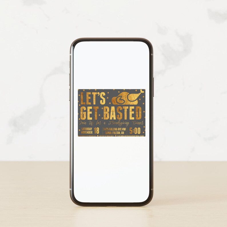 May include: A smartphone screen displaying a Thanksgiving invitation with gold lettering that reads "Let's Get Basted" and a gold illustration of a roasted turkey. The invitation includes the date, time, and address for the event.