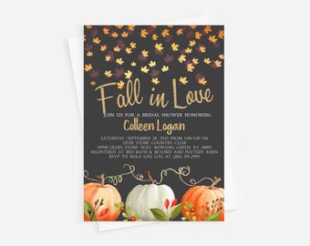 May include: Fall in Love bridal shower invitation with a dark gray background and gold glitter text. The invitation features a watercolor illustration of pumpkins and fall leaves. The text includes the date, time, location, and RSVP information.