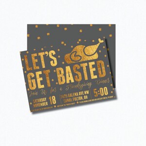 May include: Gold foil lettering on a gray background with gold confetti. The text reads "Let's Get Basted" with a gold silhouette of a roasted turkey. The text below reads "Join Us for a Friendsgiving Dinner" with the date "Saturday November 18" and the time "5:00". The address is "7425 Galena Ave NW Canal Fulton, OH".