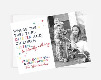 May include: A Christmas card with a photo of two children in a stroller. The text on the card reads "Where the tree tops glisten and children listen... to literally nothing. Merry everything & happy always. The Blankenbakers."
