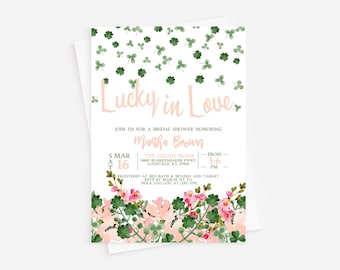May include: A bridal shower invitation with a green shamrock and pink floral design. The invitation reads "Lucky in Love" and includes the bride's name, Martha Brown, the date and time of the shower, and the location.
