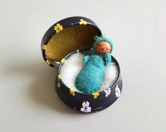 Tiny Baby in 1 1/2 Inch Tin with Lid - Doll in Jade Colored Felt inside Black Flowered Round Metal Box - Handmade Mini Bendy Doll for Gift
