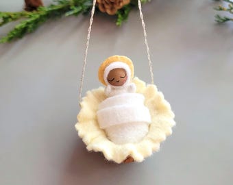 Tiny Holy Baby Swaddled in Walnut Shell Manger - Hanging Ornament - Bendable Felt Doll and Bed - Nativity Baby - Advent Calendar