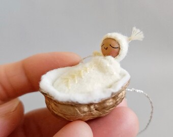 Tiny Baby Doll and Walnut Hanging Ornament - Pastel Yellow and Gold Embroidered Baby Cradle for Advent / Babys First Christmas / New Parents