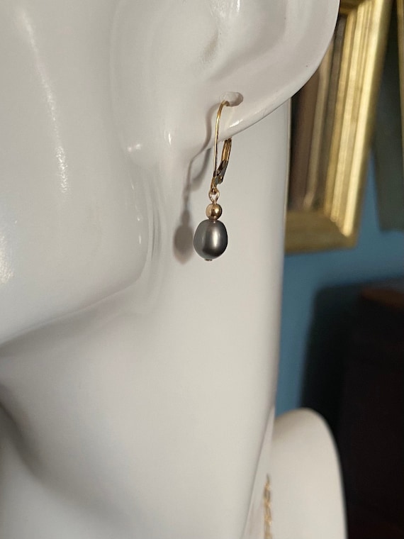 Freshwater black pearl dangle earrings on 14k yellow gold filled lever backs