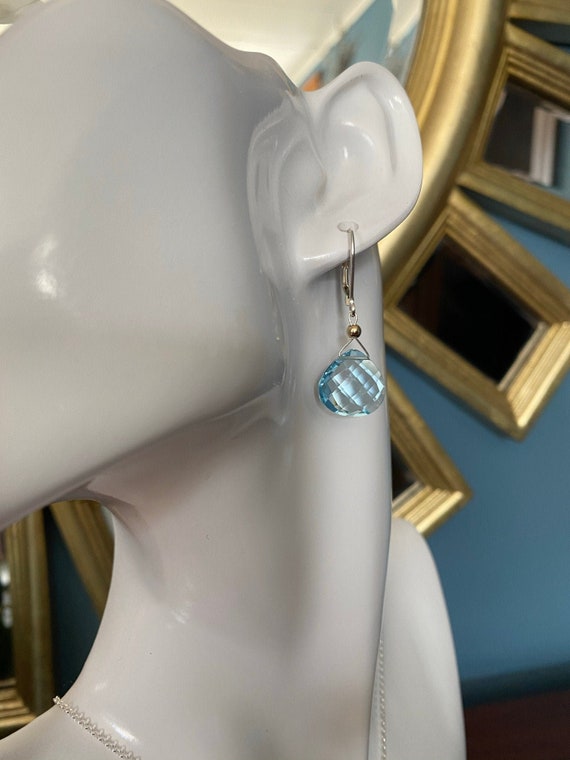 Sky Blue Topaz dangle lever back earrings with yellow gold filled beads. Sterling silver lever backs * December birthstone