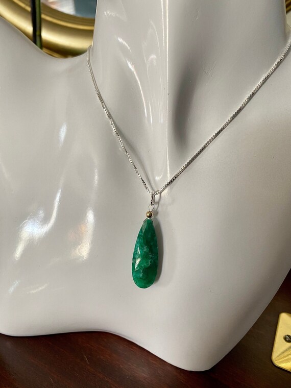 Emerald pendant on a 18” sterling silver box chain with 14k yellow gold filled bead. *May birthstone