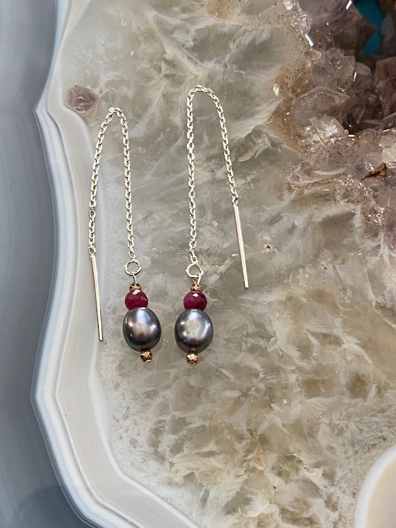 Black pearl threader earrings with genuine ruby beads and rose gold hematite beads. Freshwater black pearls, June birthstone