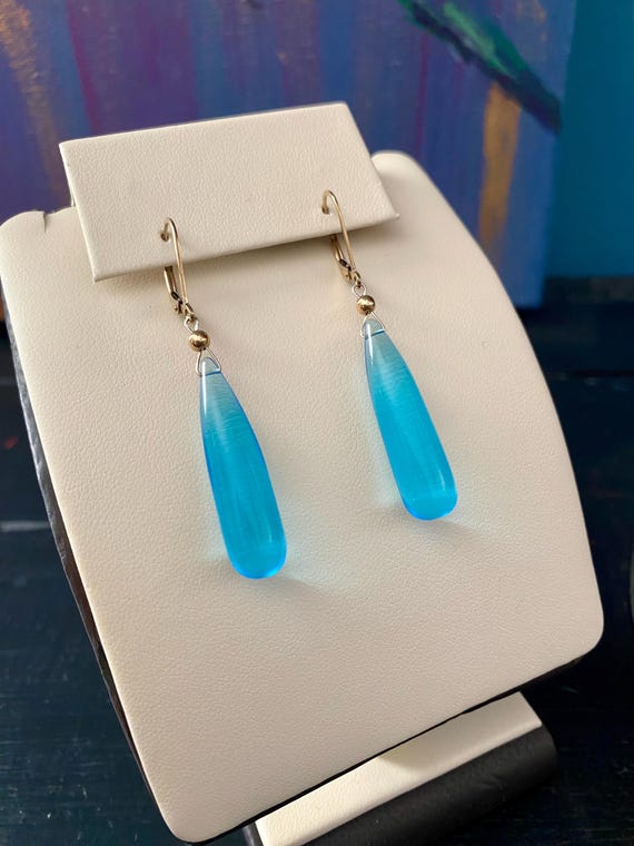 Blue Topaz dangle earrings on 14k yellow gold filled leverbacks. *Rain Drop collection