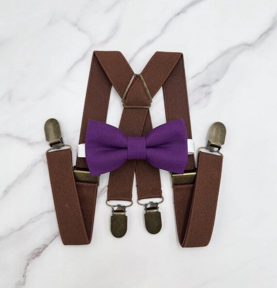 brown braces and bow tie