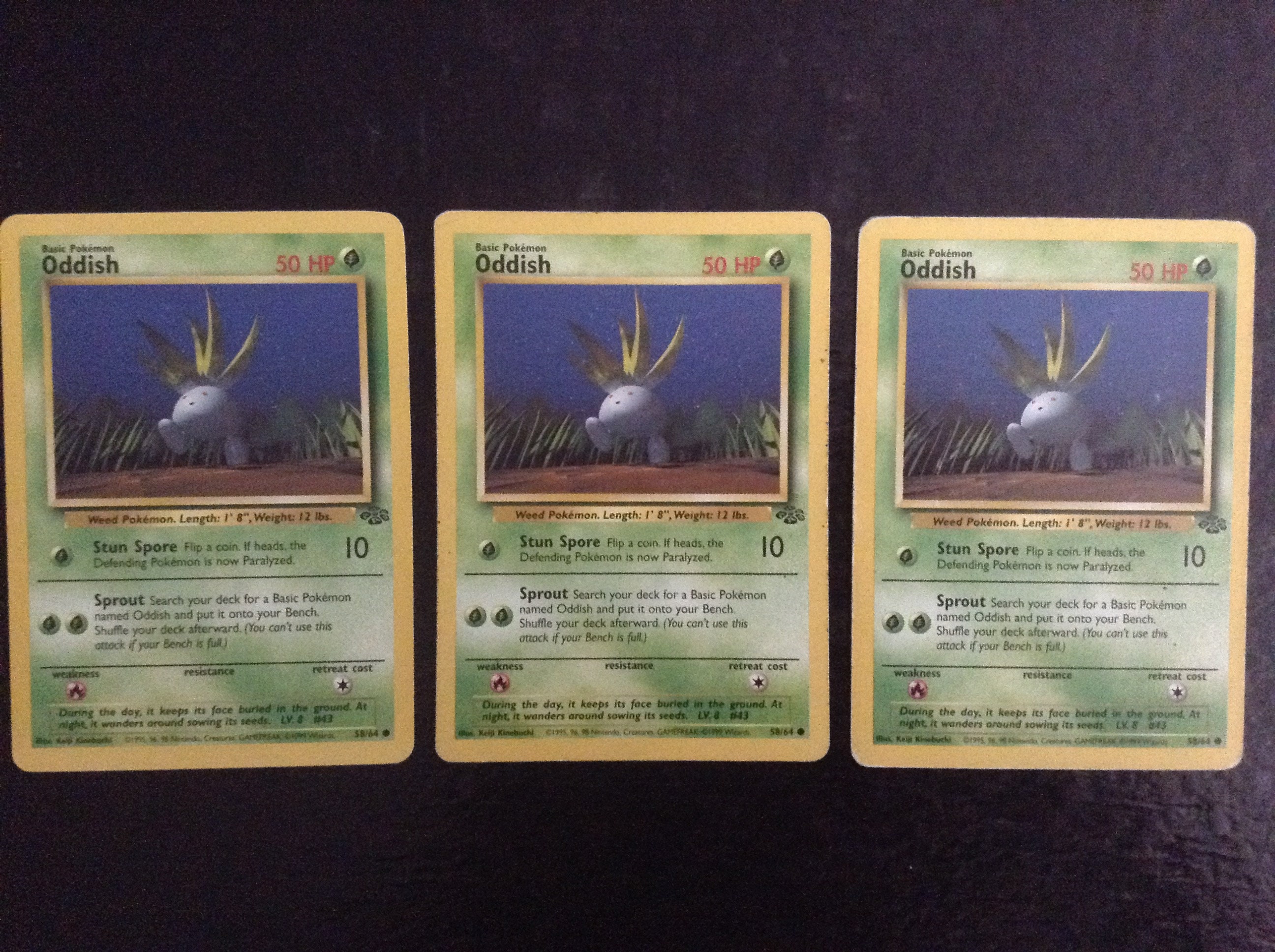 first edition oddish pokemon card NM 1st edition Oddish Pokemon Card JUNGLE Set 58/64 First Ed