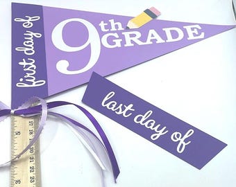 May include: A purple pennant with the text "9th Grade" and a pencil illustration. The pennant reads "first day of" on the left side. A smaller purple rectangle reads "last day of". A wooden ruler with inch measurements is also present.