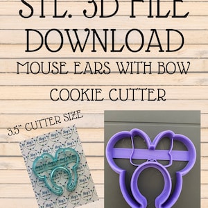 May include: Purple plastic 3D printed cookie cutter shaped like a pair of mouse ears with a bow. The cutter is 3.5 inches in size.