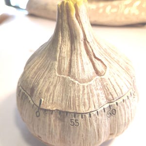 May include: A rustic wooden sign with the text "Welcome to our home" in white lettering. The sign features a distressed finish and a simple, inviting design, perfect for a front porch or entryway.