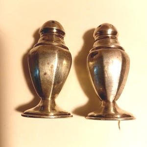 On a pedestal Sterling Silver Salt & Pepper Shakers