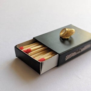 Black match box with brass - black and gold decorative matches with tea light candle