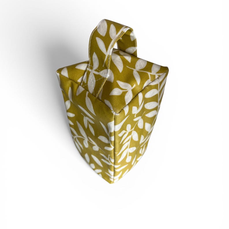 Tope de puerta con diseño de hoja en hule – Elegante accesorio para el hogar de tela en hule mate imagen 3