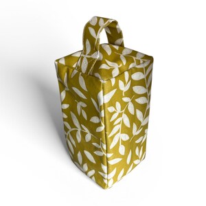 Tope de puerta con diseño de hoja en hule – Elegante accesorio para el hogar de tela en hule mate imagen 2