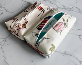 Oilcloth Baby Wipes Pouch: Dogs or Rabbits Print, Travel Size. Zipped case.