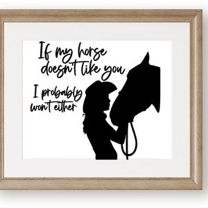 May include: Black and white silhouette of a woman wearing a cowboy hat and a horse. The text reads "If my horse doesn't like you I probably won't either."