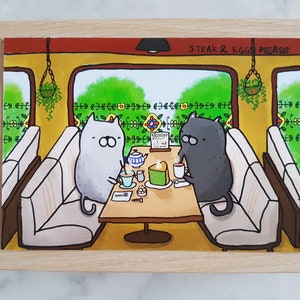 Cartolina Cat Cafe, cartolina postale con gatto sciocco