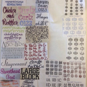 K&ouml;nnte beinhalten: Eine Sammlung von Schriftproben f&uuml;r Stickereien, darunter Bauhaus, Jasper, Jumping Bean, Curly, Harper, Jingle, Stuyvesant und Large Block. Die Proben umfassen Gro&szlig;- und Kleinbuchstaben, Zahlen und Satzzeichen. Die Schriften werden in verschiedenen Stilen angezeigt, darunter Schreibschrift, Blockschrift und Kursivschrift.