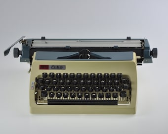 Máquina de escribir Daro Erika, manual, vintage, portátil, beige, retro