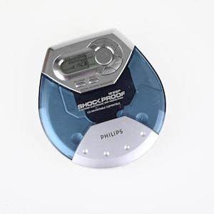 Reproductor de CD Philips AX2101 vintage, reproductor de CD portátil vintage, reproductor de CD, audio vintage, música retro, reproductor portátil, audio clásico