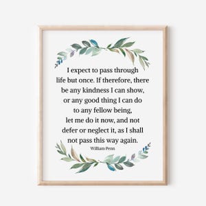 May include: A framed print with a quote by William Penn, encircled by a watercolour botanical wreath. The quote begins, "I expect to pass through life but once..." The frame is light wood, and the background is off-white.