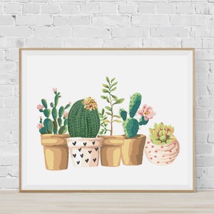 May include: A framed print featuring a watercolor illustration of various cacti and succulents in terracotta pots. The cacti are green with pink flowers, and the pots have heart and polka dot designs. The artwork is set against a white background.