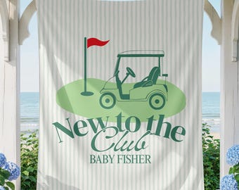 May include: A light green and white striped banner with a golf theme. The banner features a golf cart, a flag, and the text "New to the Club BABY FISHER" in green. The banner is hanging outside with a view of the ocean.