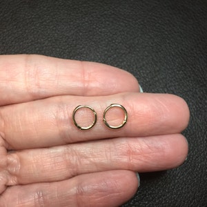 Seriously Tiny 14K Solid Gold Huggies Hoop Earrings image 3