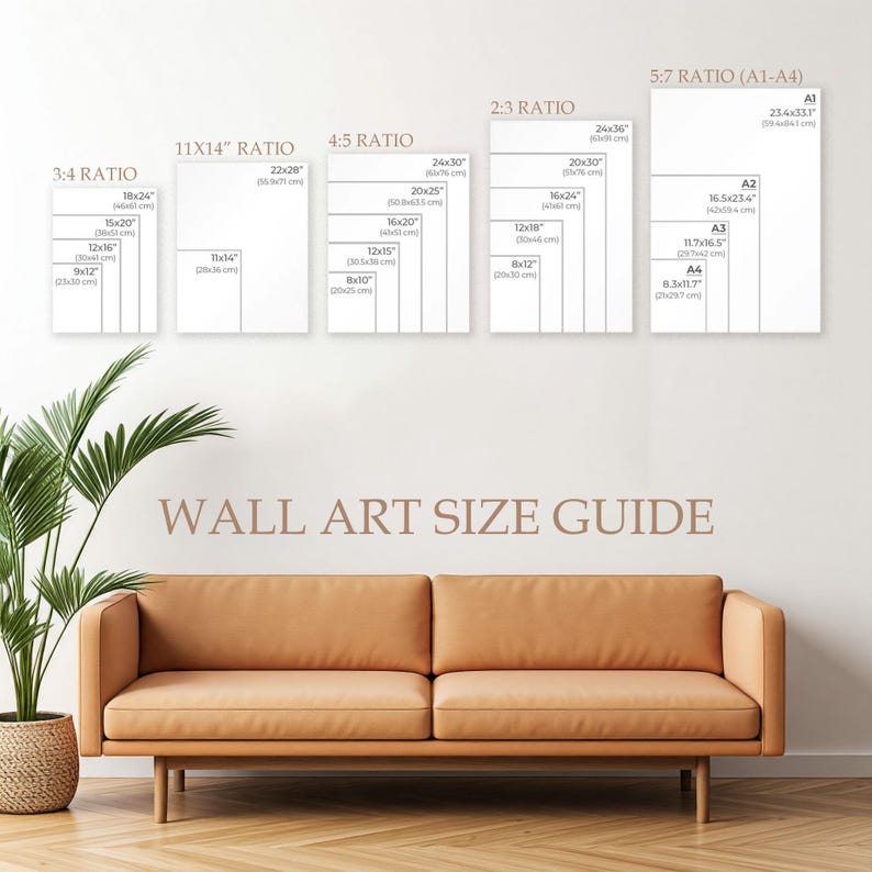 May include: A wall art size guide with various aspect ratios and dimensions in inches. The guide includes sizes like 18x24, 22x28, and A1-A4, displayed on white rectangles. A tan sofa and a potted plant are in the foreground.