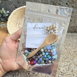 DIY Bracelet Making Kit Complete Jewelry Project Set Mixed Bead Collection Gold Silver Accent Beads Stretch Cord Design Pack Teen Craft Activity Girls Night Party Project Beginner Friendly Instructions Included Creative Hobby Set Group