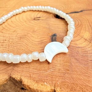Elastic Band Bracelet Moon Charm Design White Bead Collection Beach Style Essential Boho Fashion Accessory Casual Wear Piece Everyday Style Element Multiple Size Options Beautiful Shell Detail Celestial Theme Collection Natural Fashion