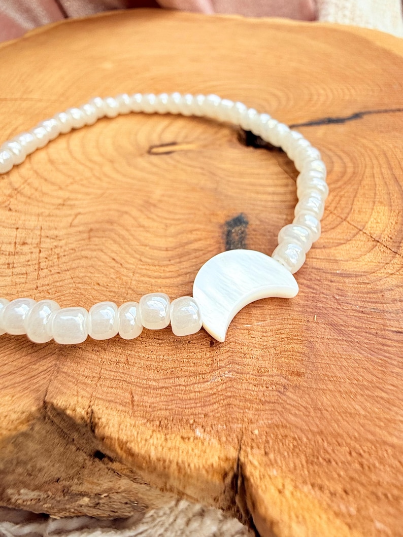 Elastic Band Bracelet Moon Charm Design White Bead Collection Beach Style Essential Boho Fashion Accessory Casual Wear Piece Everyday Style Element Multiple Size Options Beautiful Shell Detail Celestial Theme Collection Natural Fashion