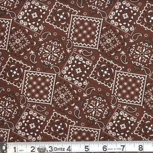 May include: Brown fabric with a white bandana print. The fabric features a repeating pattern of paisley and square bandana designs.