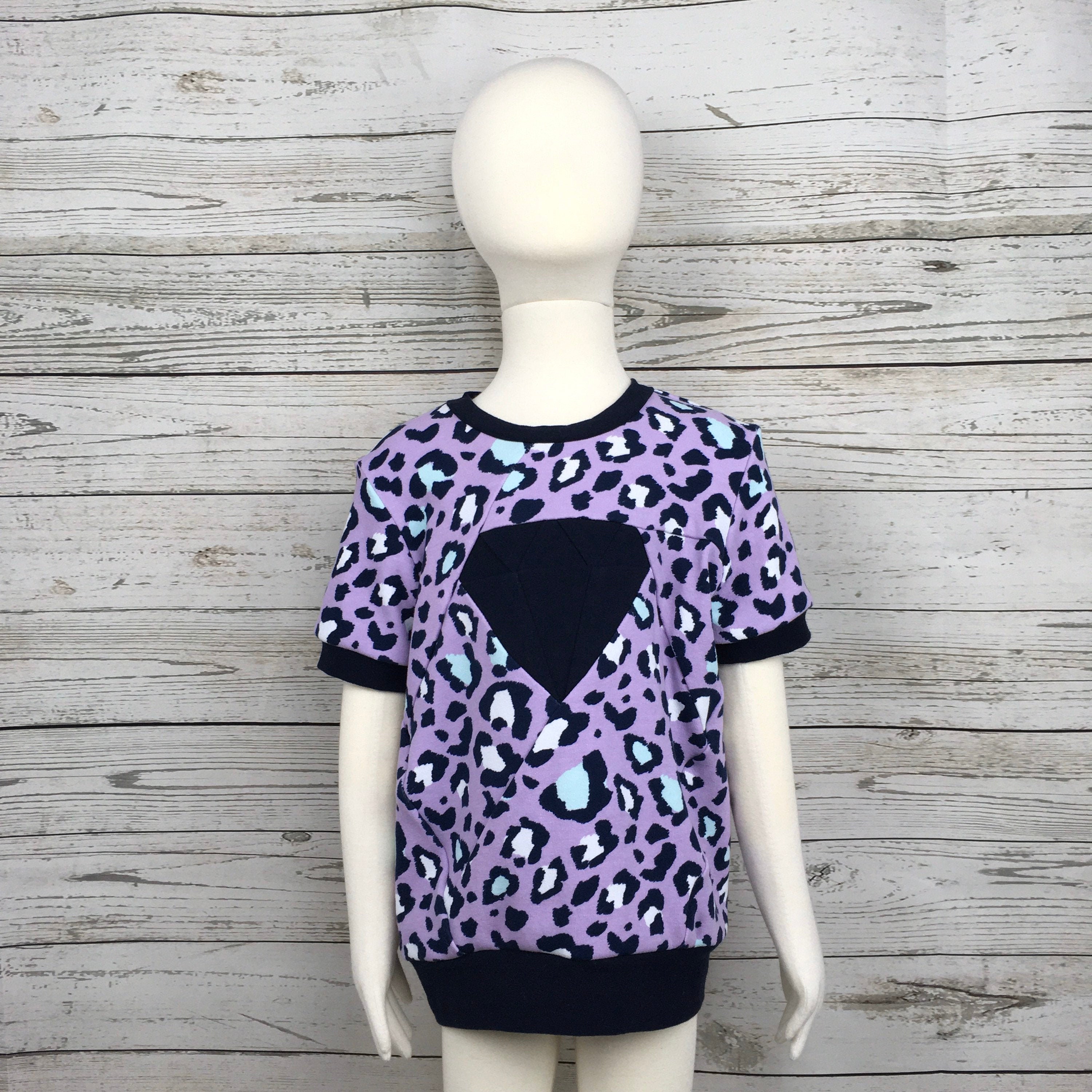 GROOVY BABY SHOT Ⅰ PURPLE & Ⅳ LEOPARD Upcycled purple bike short | Mini Rodini
